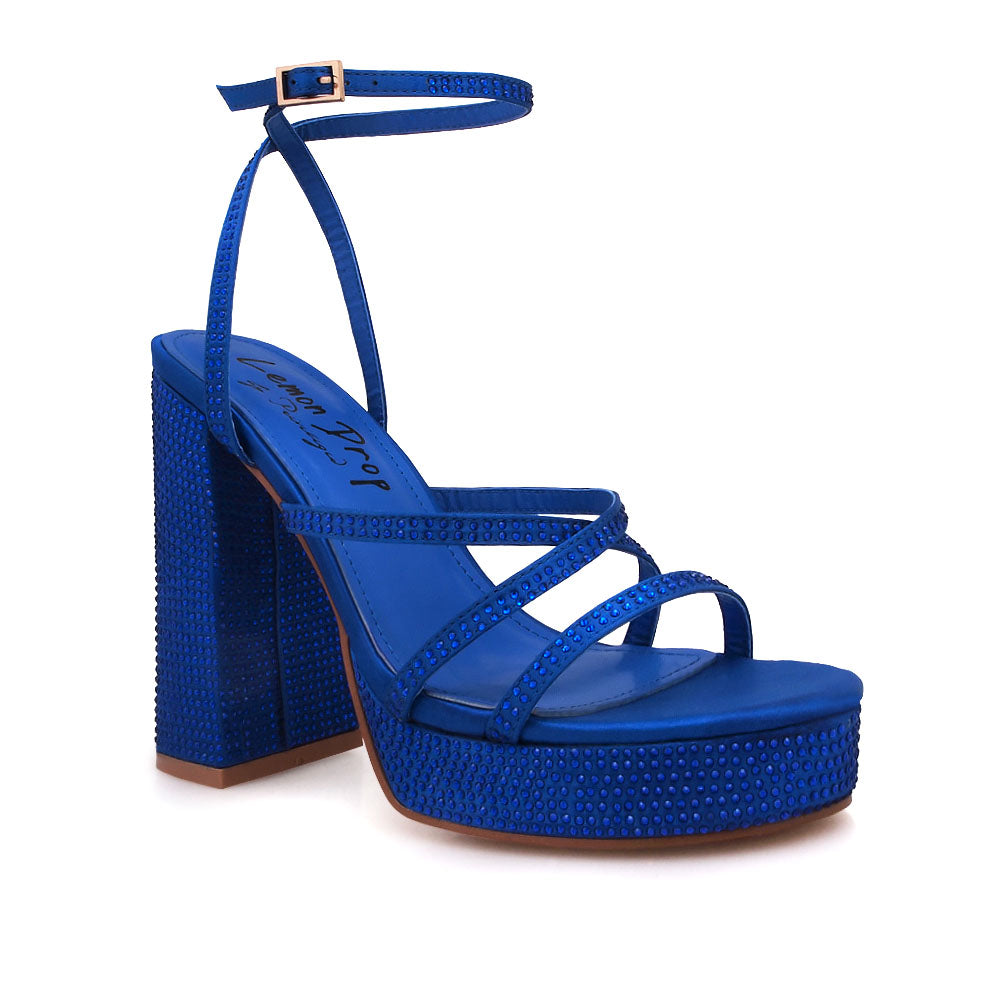 Cobalt colored platform heels with crystal embellishment and ankle buckle closure - corner view