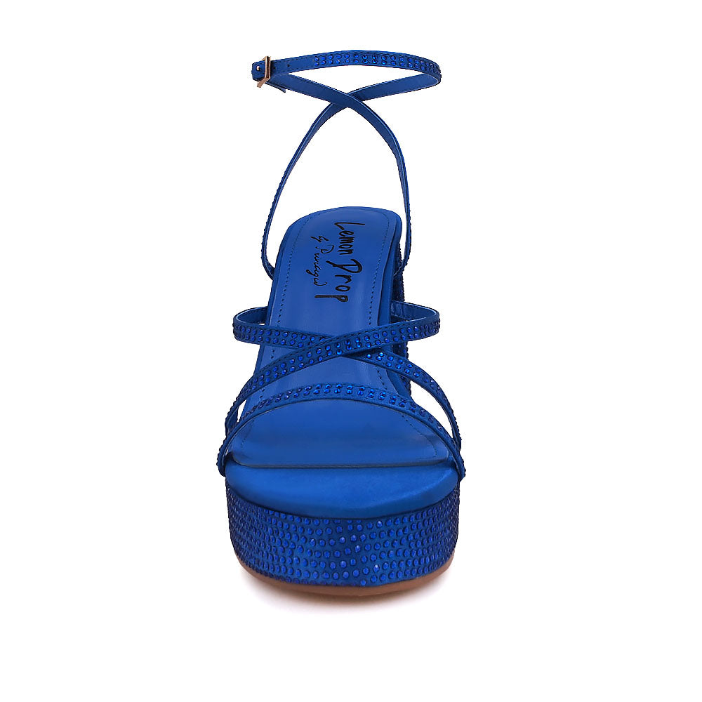 Cobalt colored platform heels with crystal embellishment and ankle buckle closure - front view