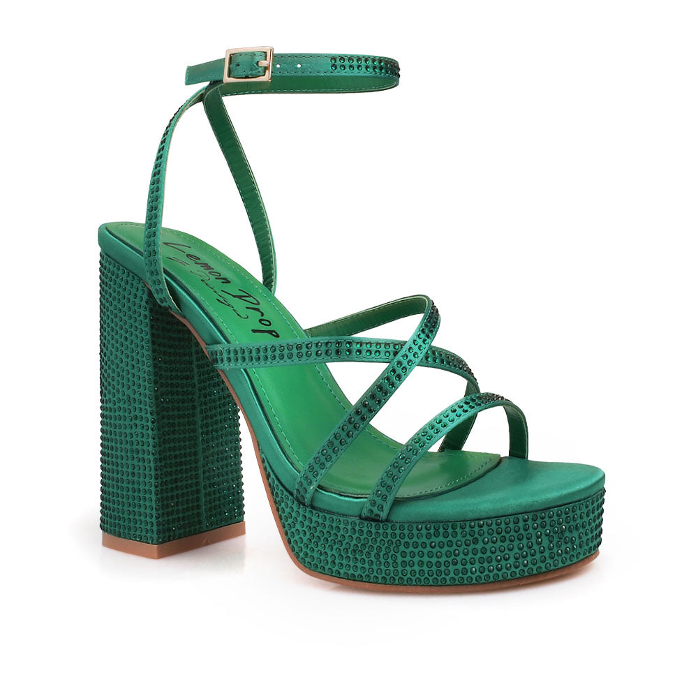 Green colored platform heels with crystal embellishment and ankle buckle closure - corner view