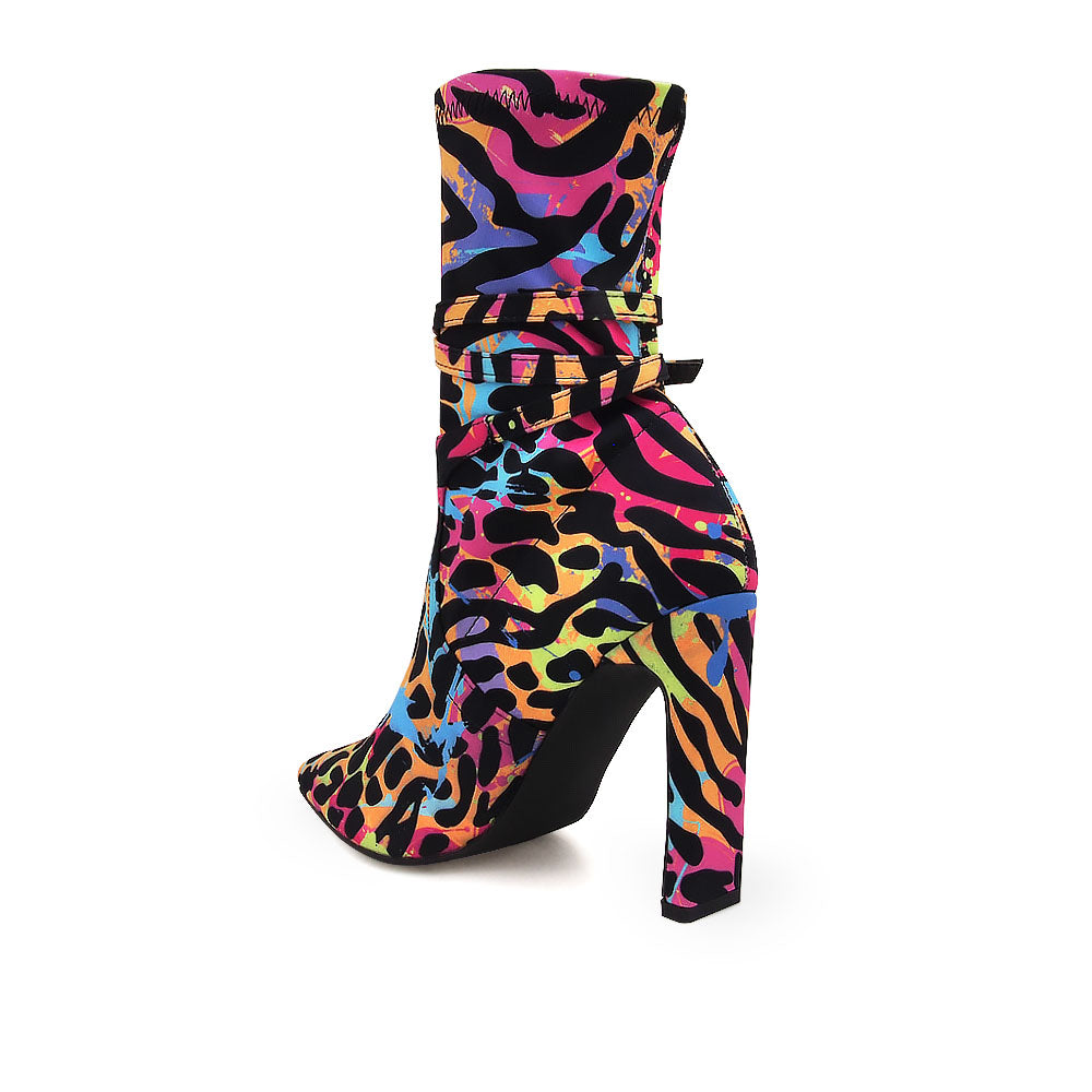 Black ankle-high boot heels with pointed toe and multi-colored leopard print upper - back view
