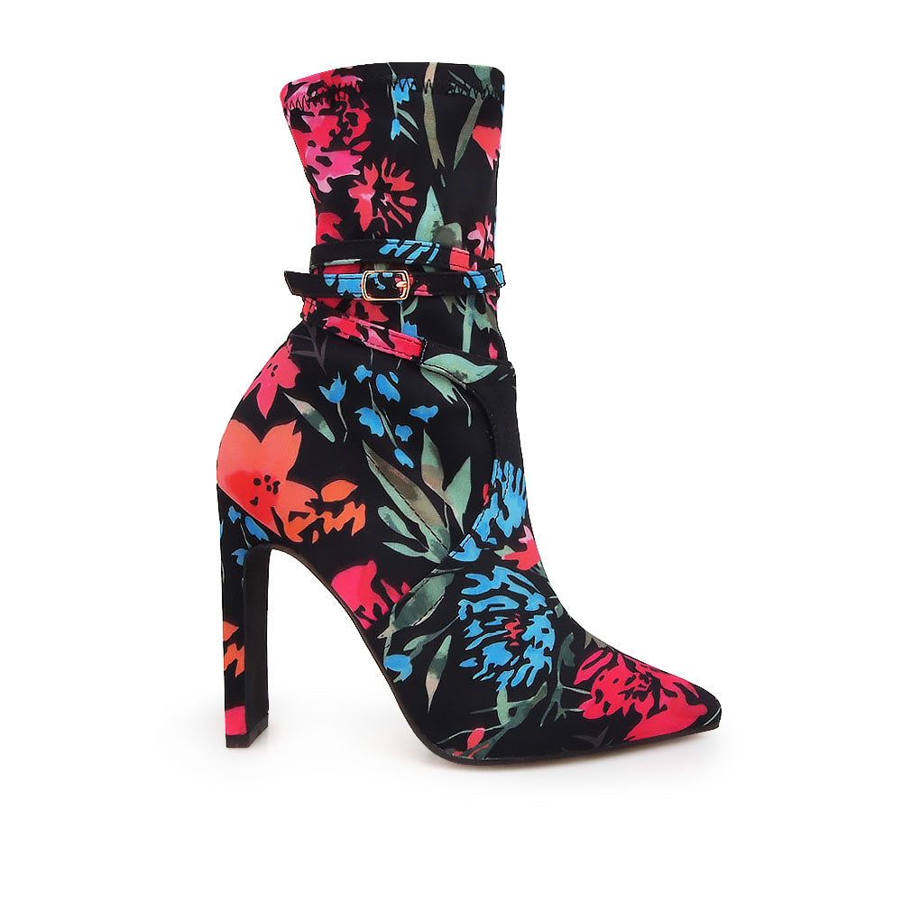 Ankle-high boot heels in black with pointed toe and multicolored floral print upper - side view