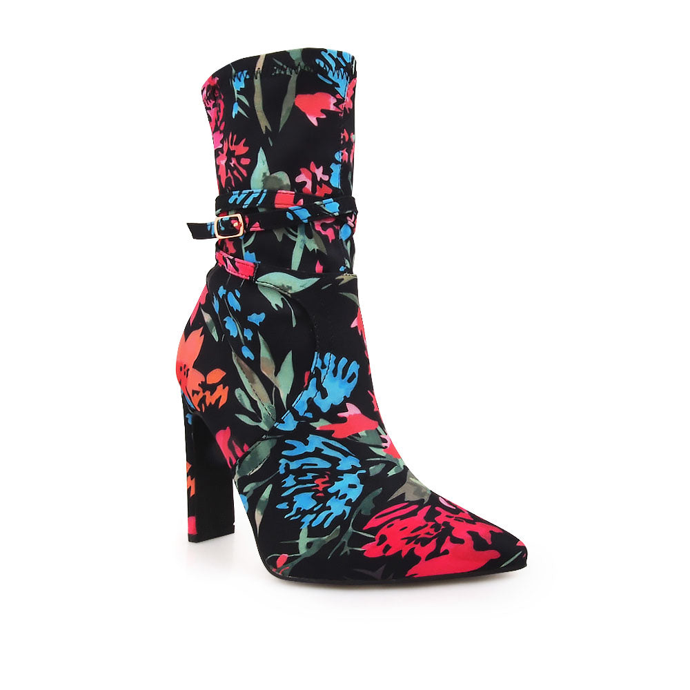 Ankle-high boot heels in black with pointed toe and multicolored floral print upper - corner view