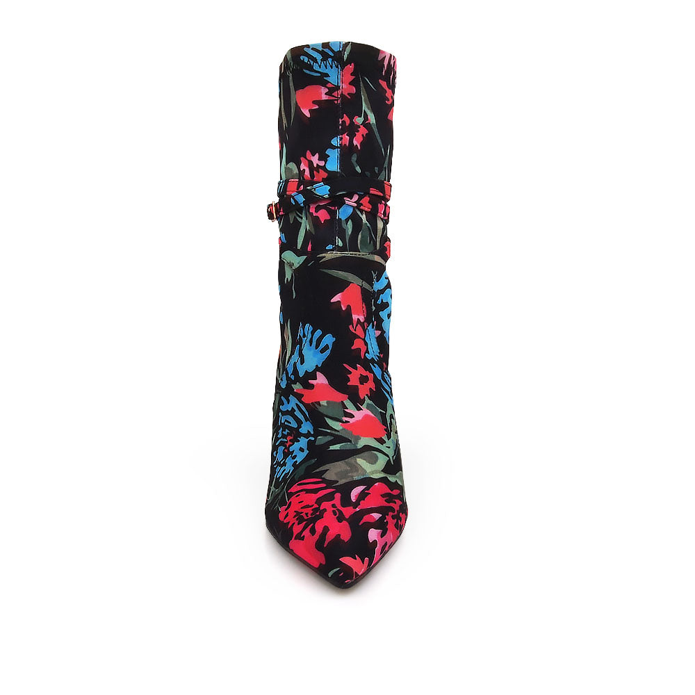 Ankle-high boot heels in black with pointed toe and multicolored floral print upper - front view