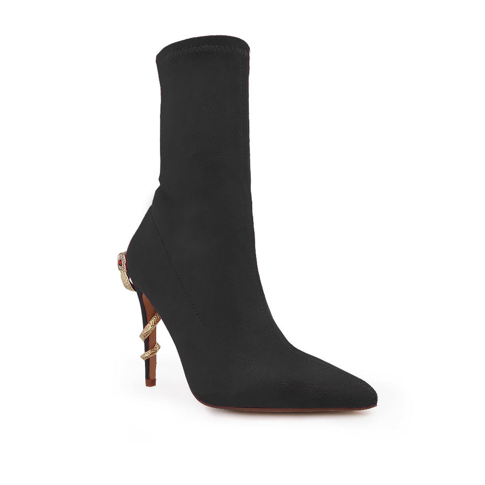 Black pointed toe stiletto heels boots with snake design on heels - corner view