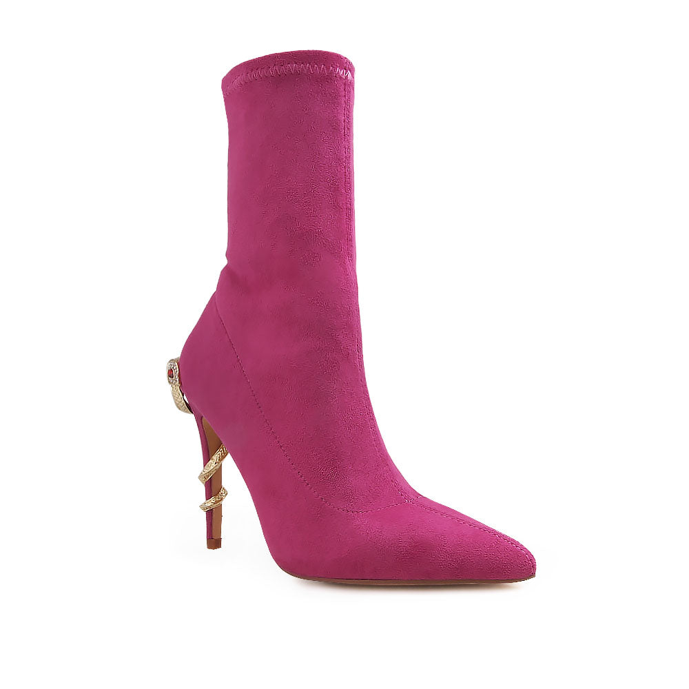 Fuchsia pointed toe stiletto heels boots with snake design on heels - corner view