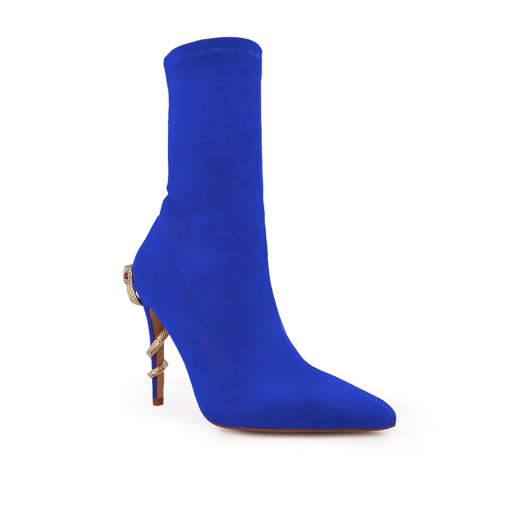 Blue pointed toe stiletto heels boots with snake design on heels - corner view