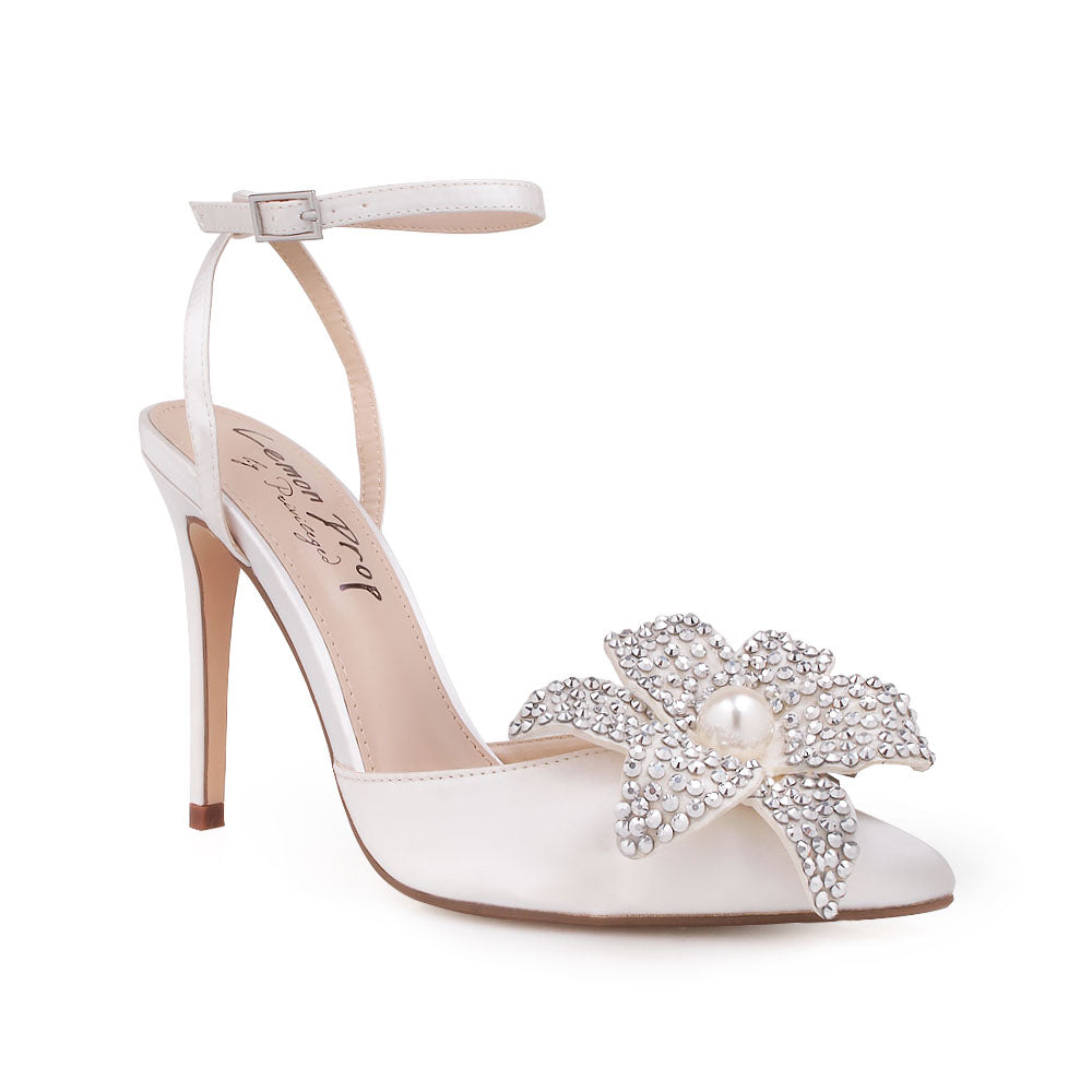 White stiletto heel with flower pearl embellished upper and ankle strap closure - corner view