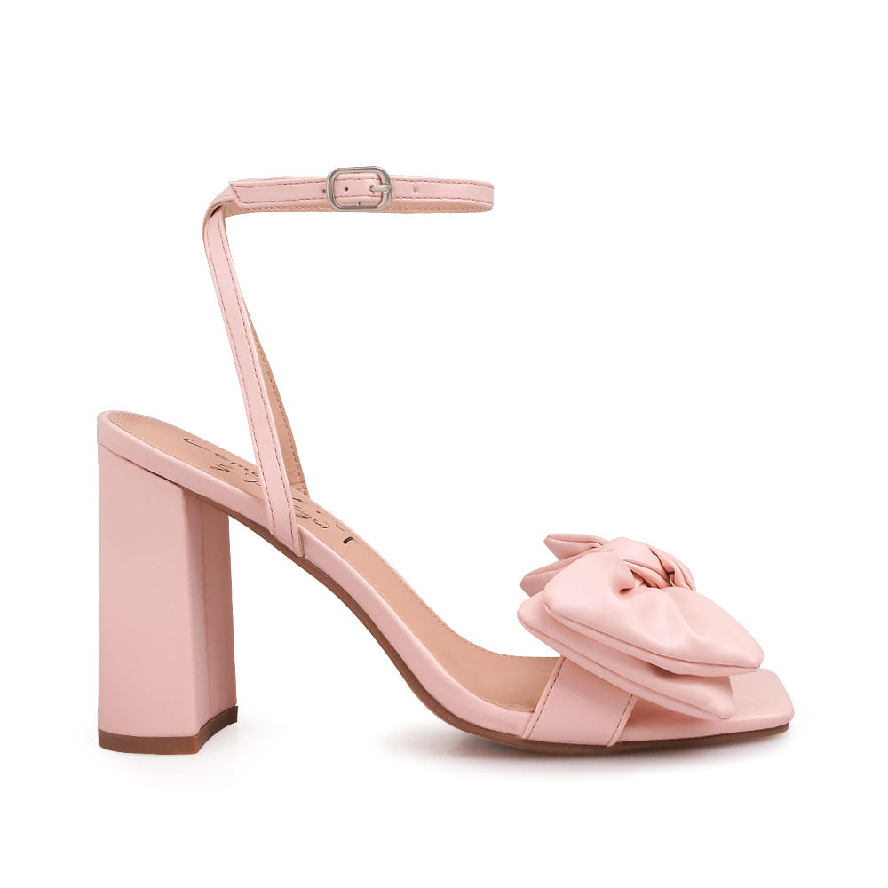 Blush heels with bow design upper and ankle buckle clasp - side view