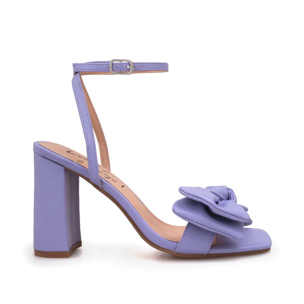 Lilac heels with bow design upper and ankle buckle clasp - side view