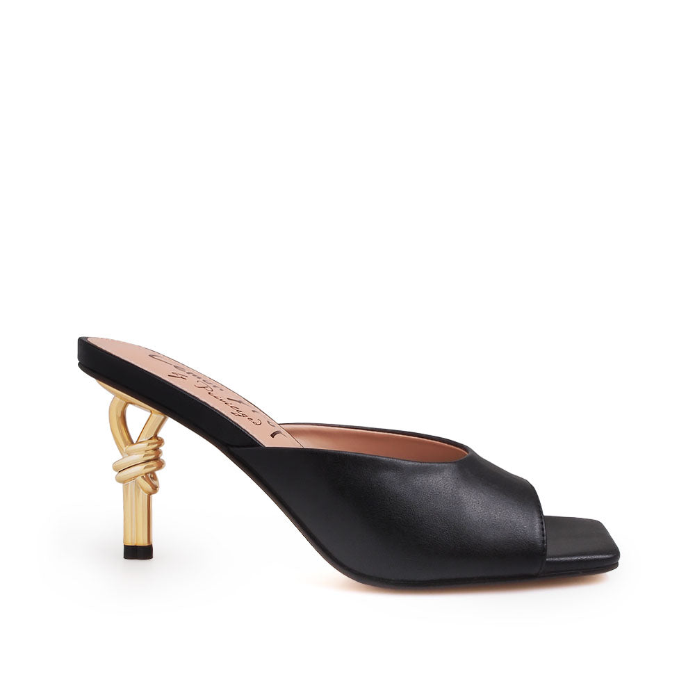 Golden knot metal heels with black upper and squared toe sandals - side view