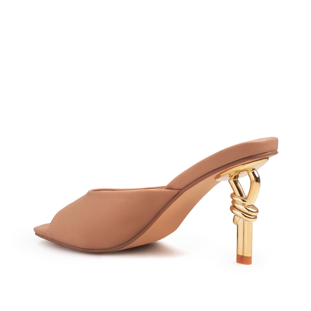 Golden knot metal heels with nude upper and squared toe sandals - back view