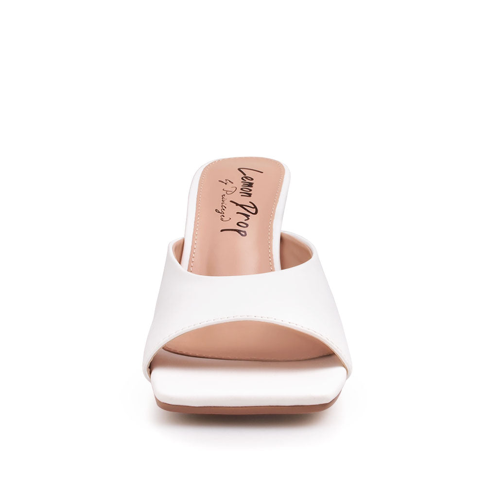 Golden knot metal heels with white upper and squared toe sandals - front view