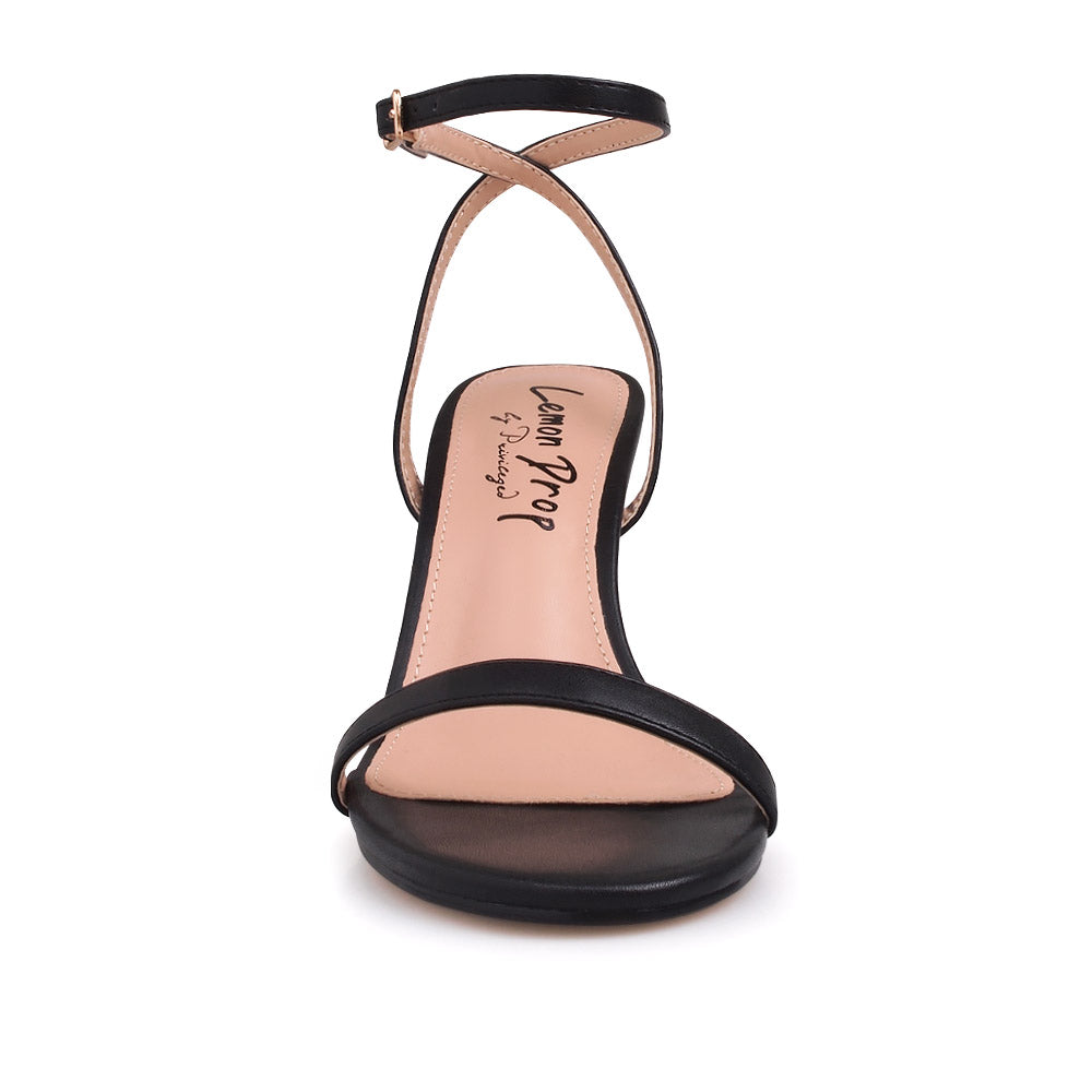 Golden Knot metallic heels with black upper and ankle strap closure - front view