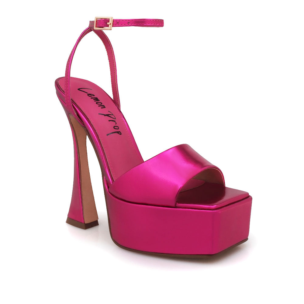 Fuchsia colored open toe platform heels with ankle strap closure - corner view