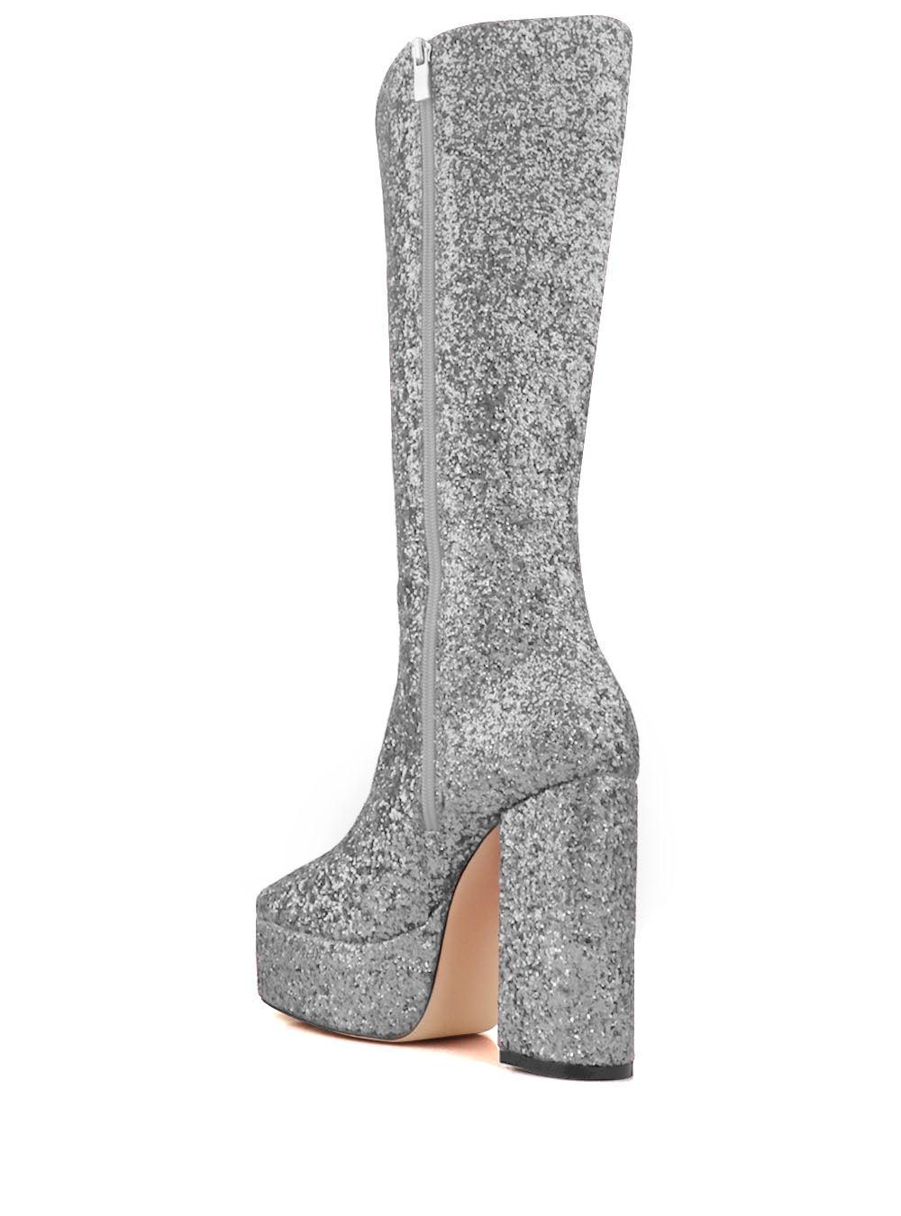 Women's gleaming silver-colored knee high platform boots with glitter accent and side zipper-corner view