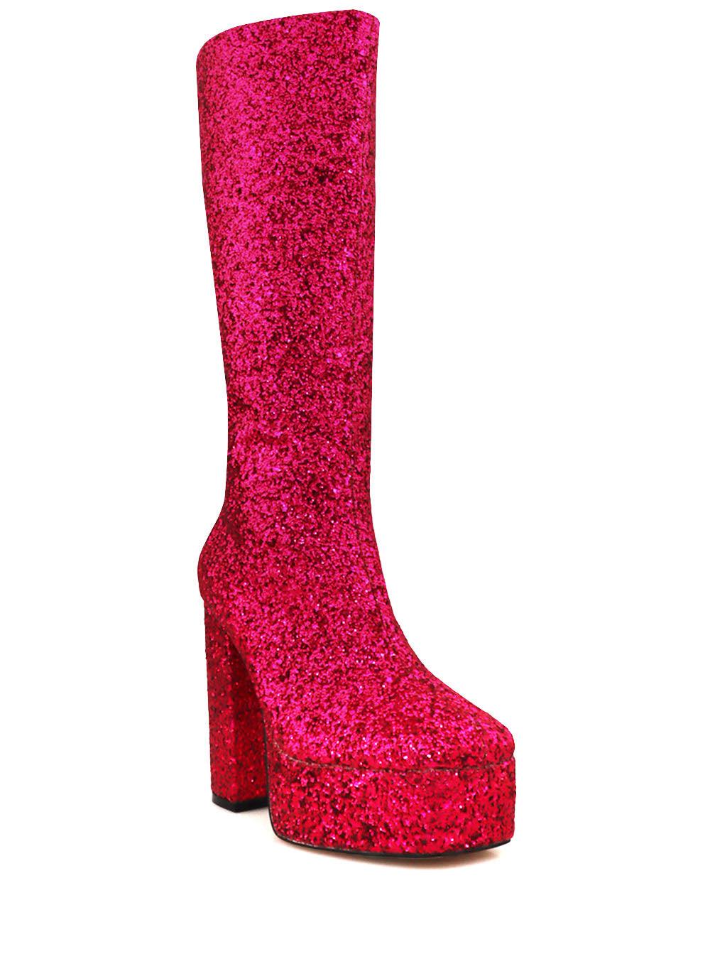 Glistening fuchsia-colored knee high platform boots for women with glitter accent and side zipper-corner view