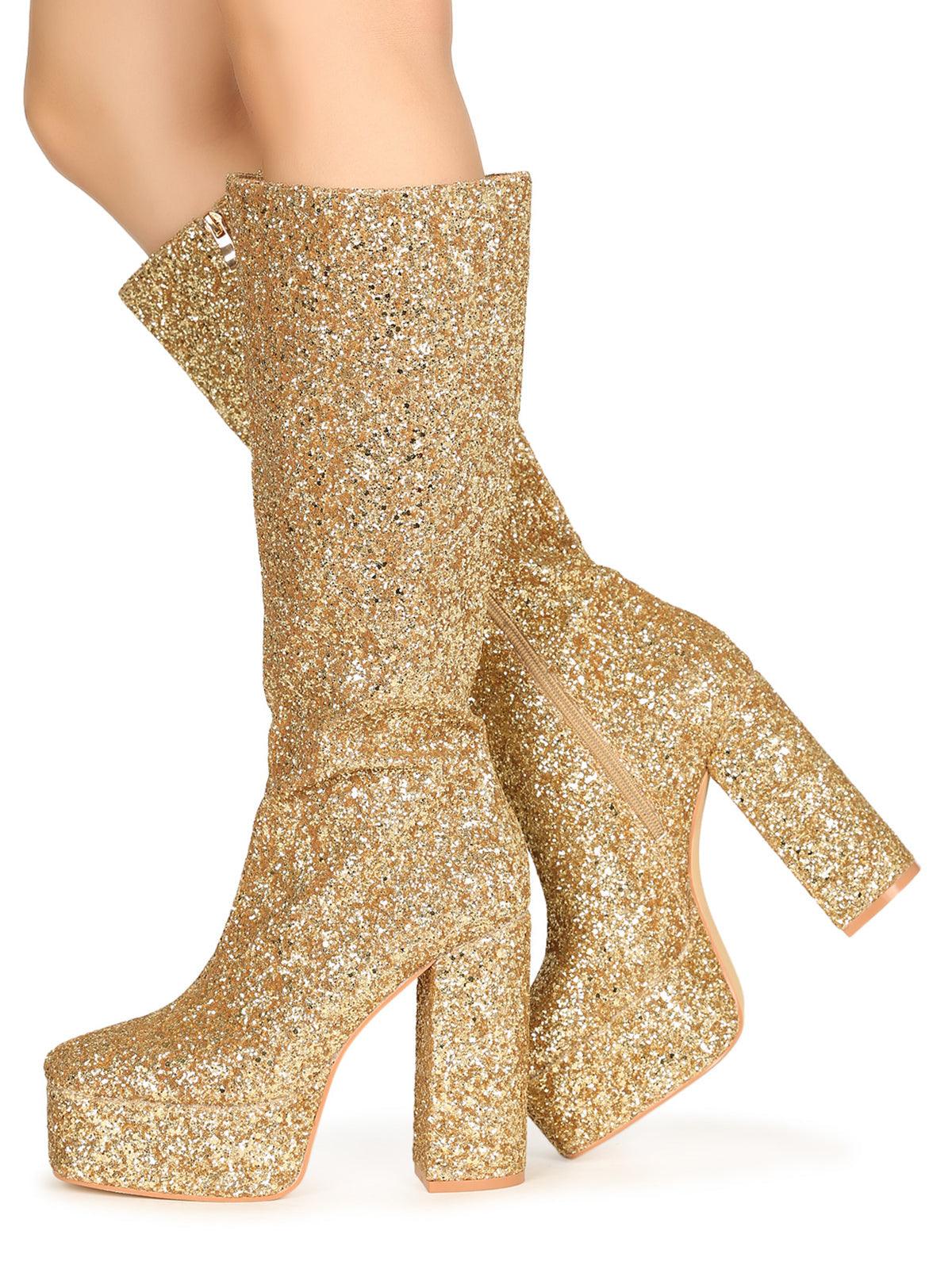 Golden-colored women's knee high platform boots with glitter accent and side zipper
