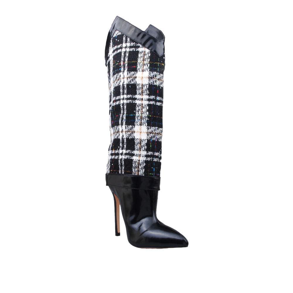 Medium heighted women boots in white and black color-corner view