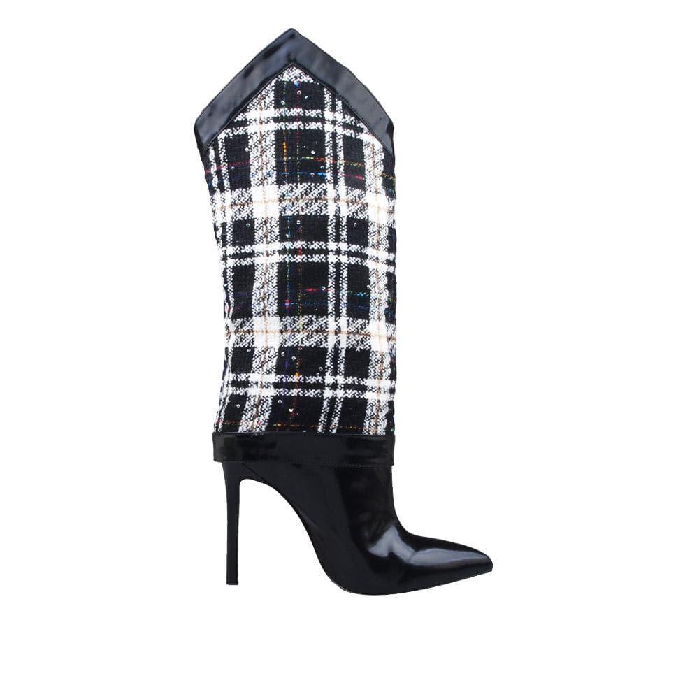 Medium heighted women boots in white and black color-side view