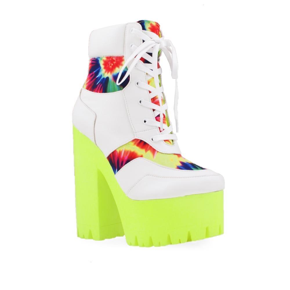 Neon yellow platform women's block heel boots with white lace up-corner view