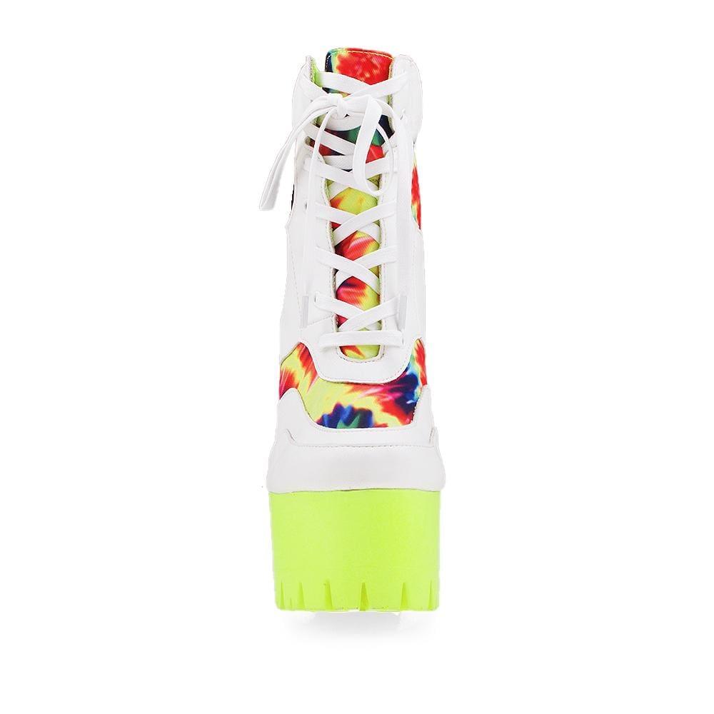 Neon yellow platform women's block heel boots with white lace up-front view
