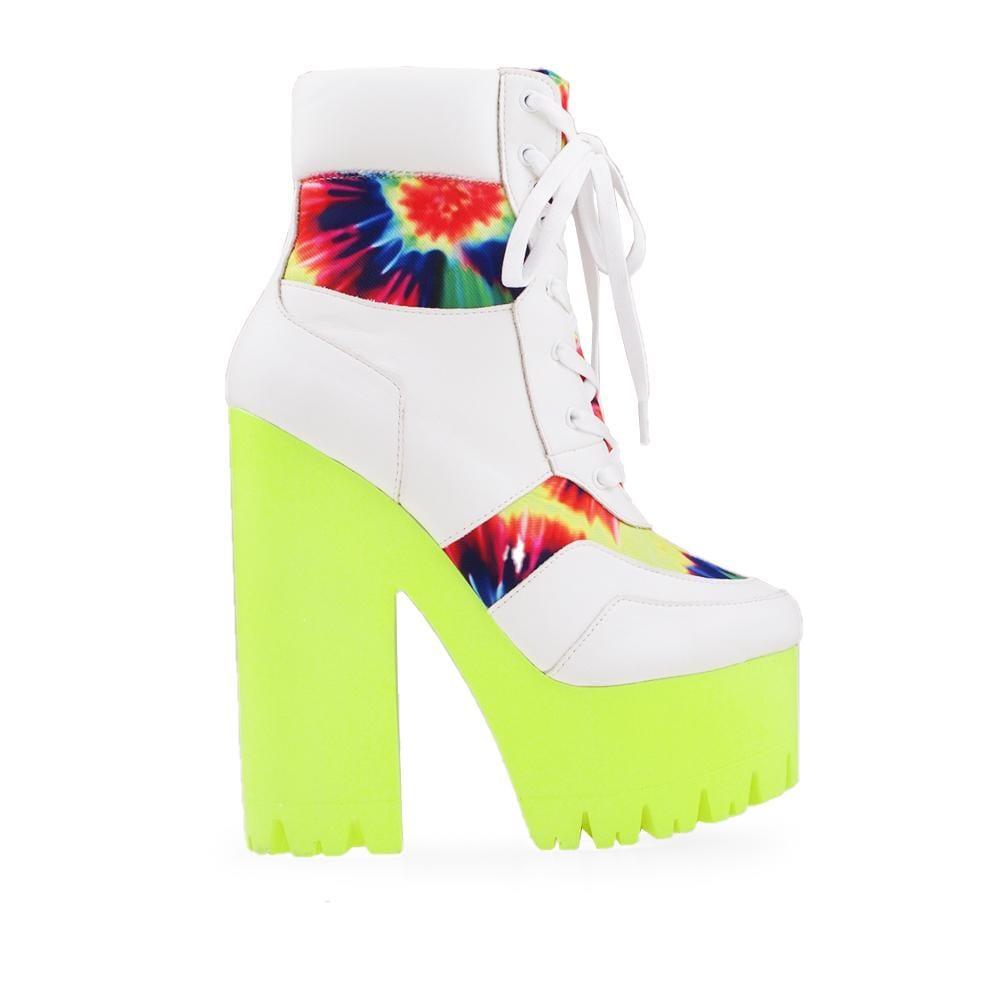 Neon yellow platform women's block heel boots with white lace up-side view