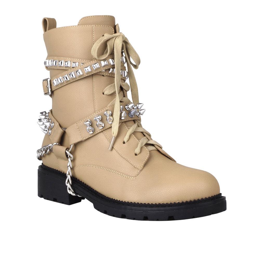 Taupe-colored ankle boots for women with silver metallic studs and chains-corner view
