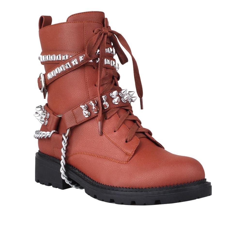 Brown-colored ankle boots for women with metallic studs and chains-corner view