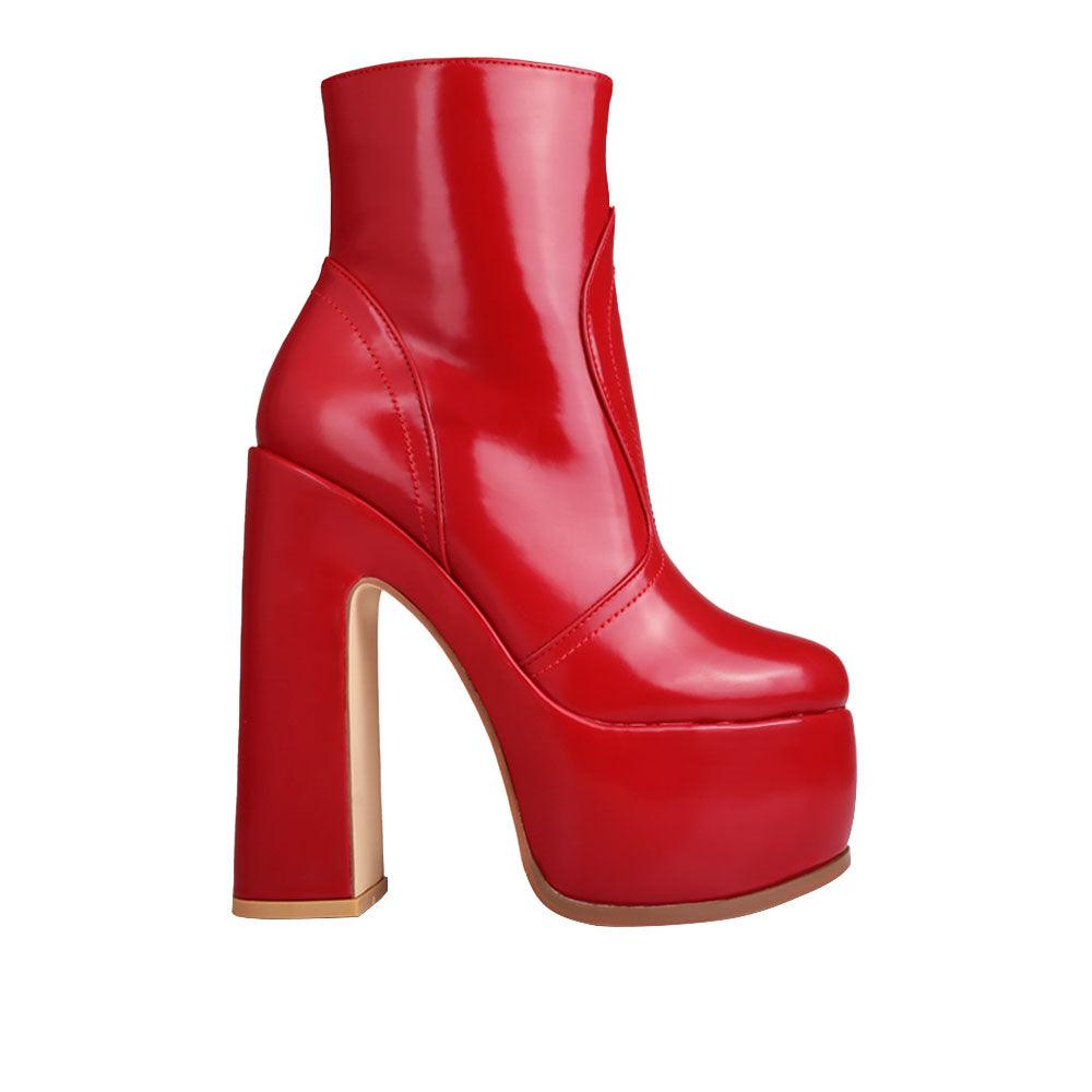 Burgundy-colored women's ankle boots with block heels and side zipper closure-side view