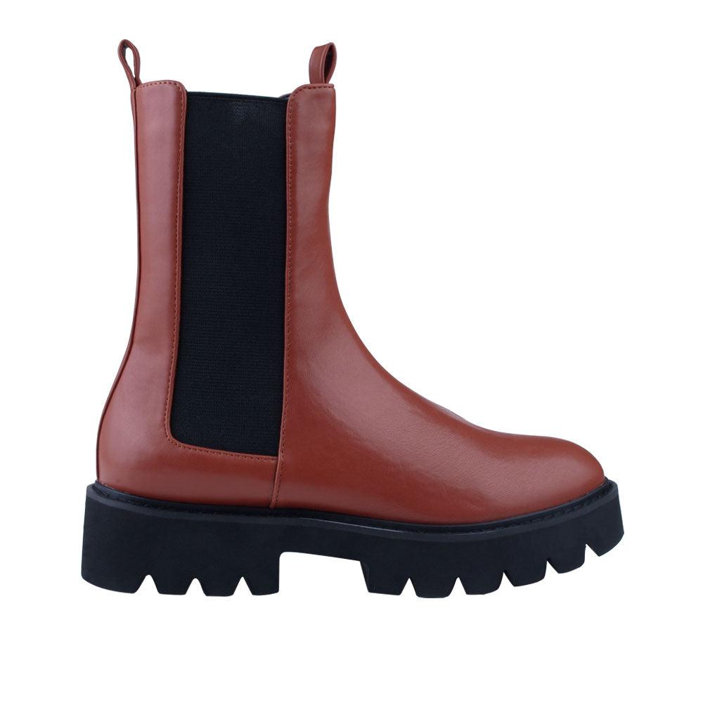 Cognac and black colored ankle high boots with slip on style