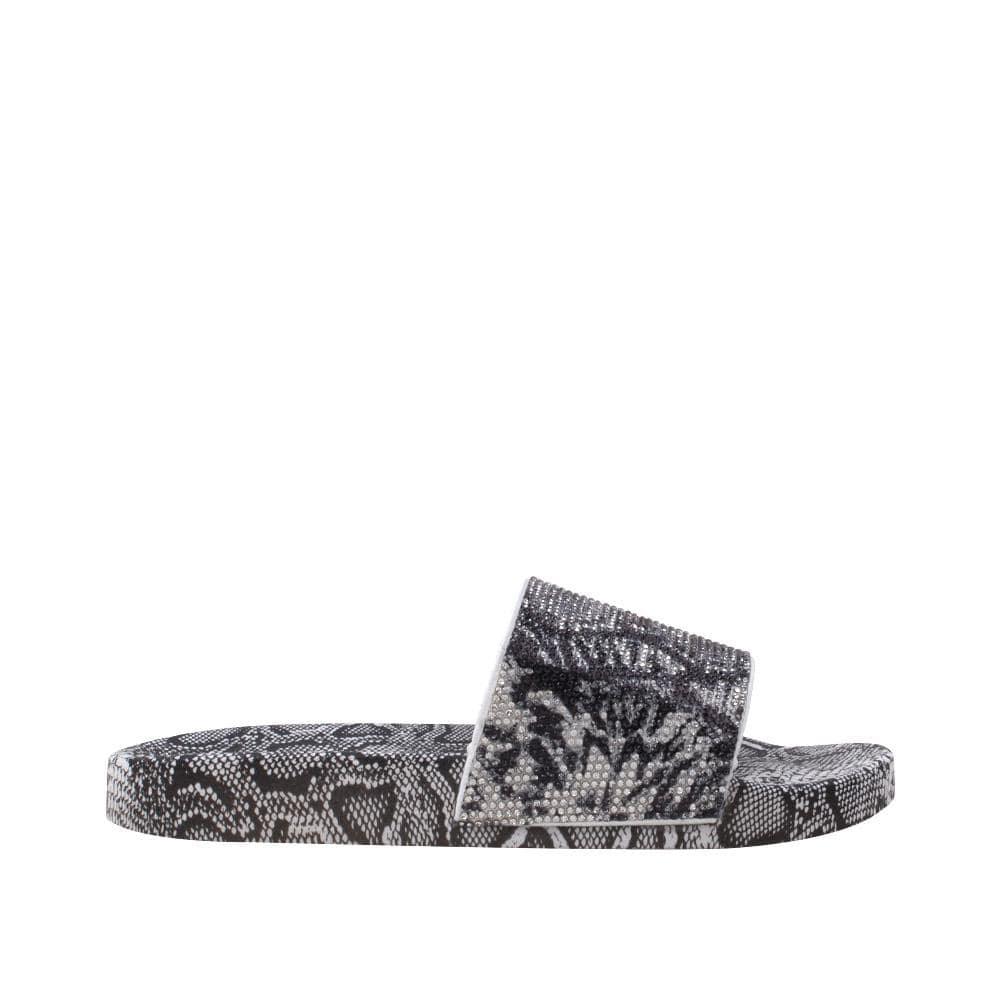 black women's flat slippers with black and white snake print-side view