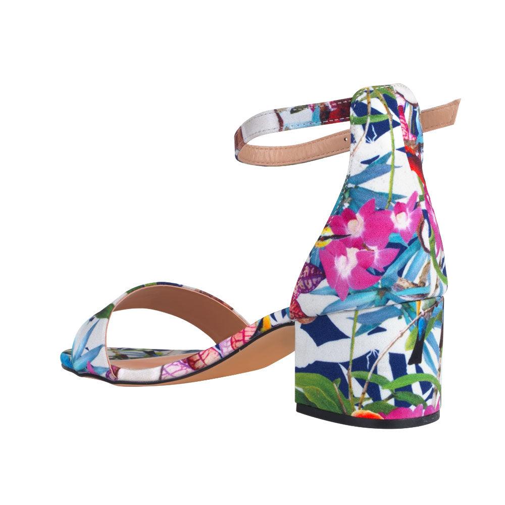 Floral-patterned heel flats with an ankle buckle strap and strap-posterior view
