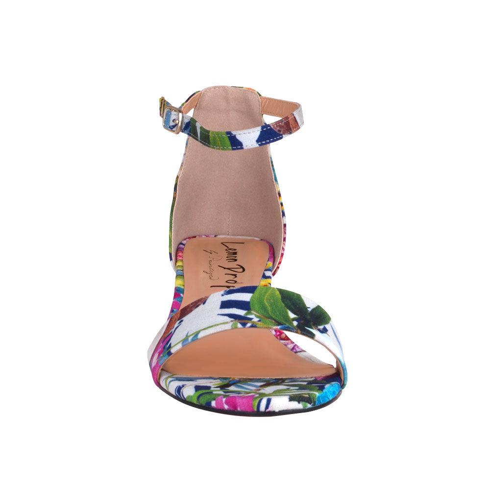 Floral-patterned heel flats with an ankle buckle strap and strap-front view