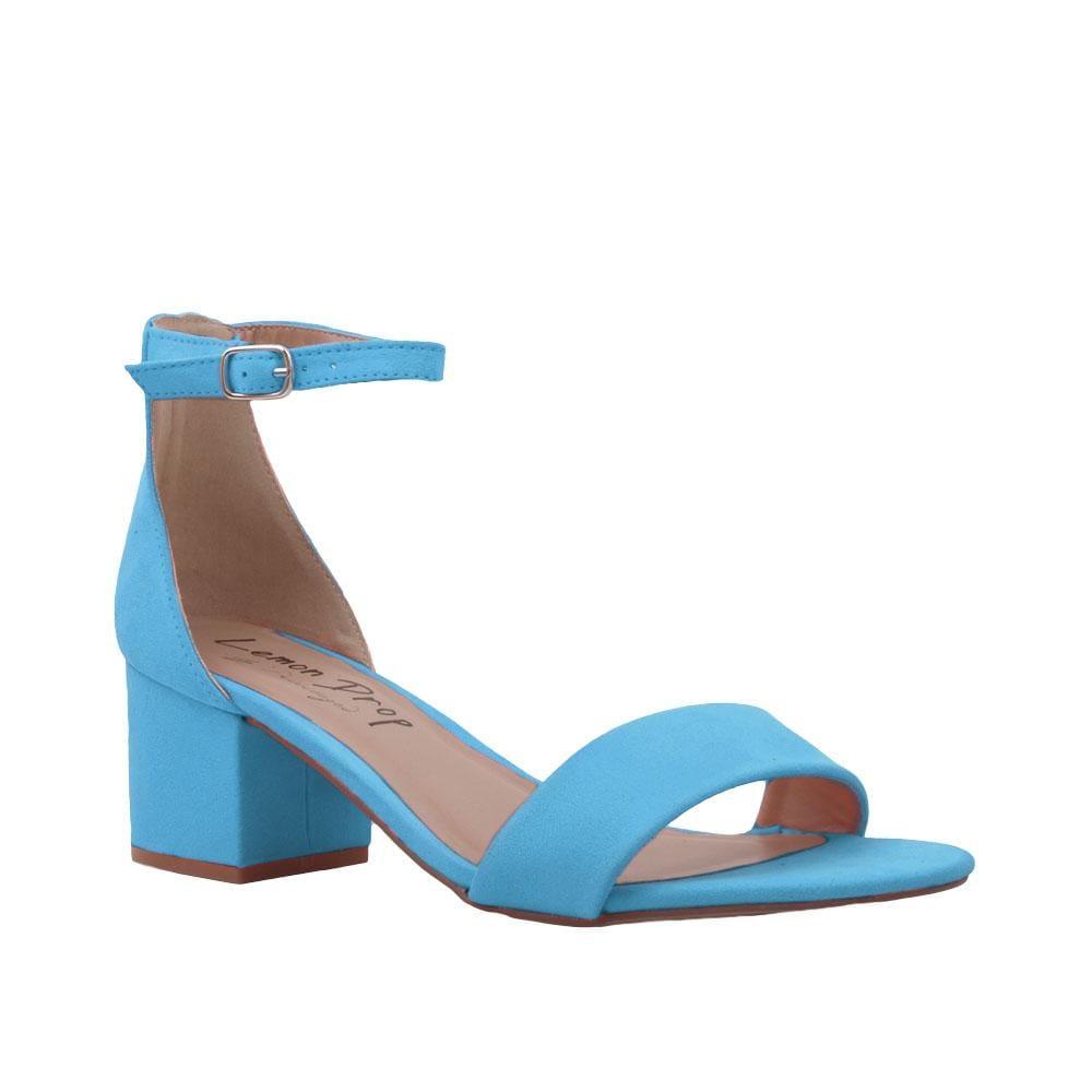 Heel flats in turquoise-colored with a buckle ankle clasp and strapped open toe-corner view