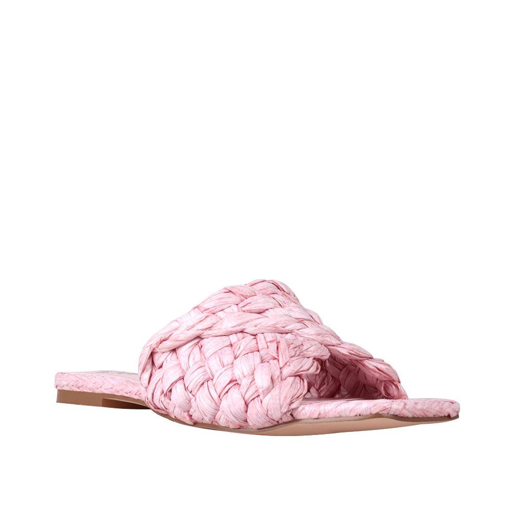 Women's pink-colored woven straw flat slippers-corner view