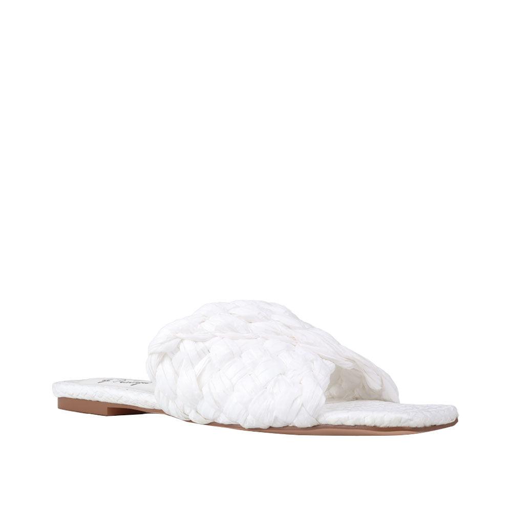 Women's woven straw flat slippers in a white-color-corner view
