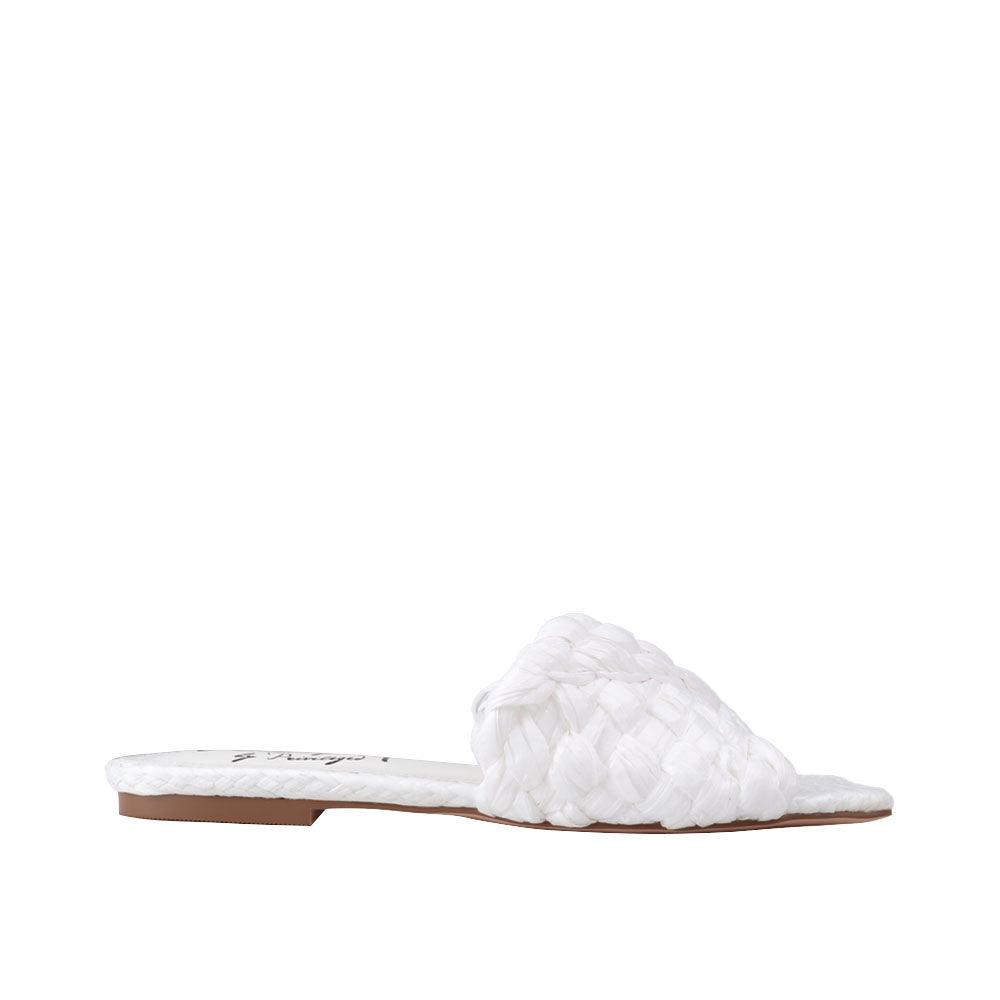 Women's woven straw flat slippers in a white-color-side view