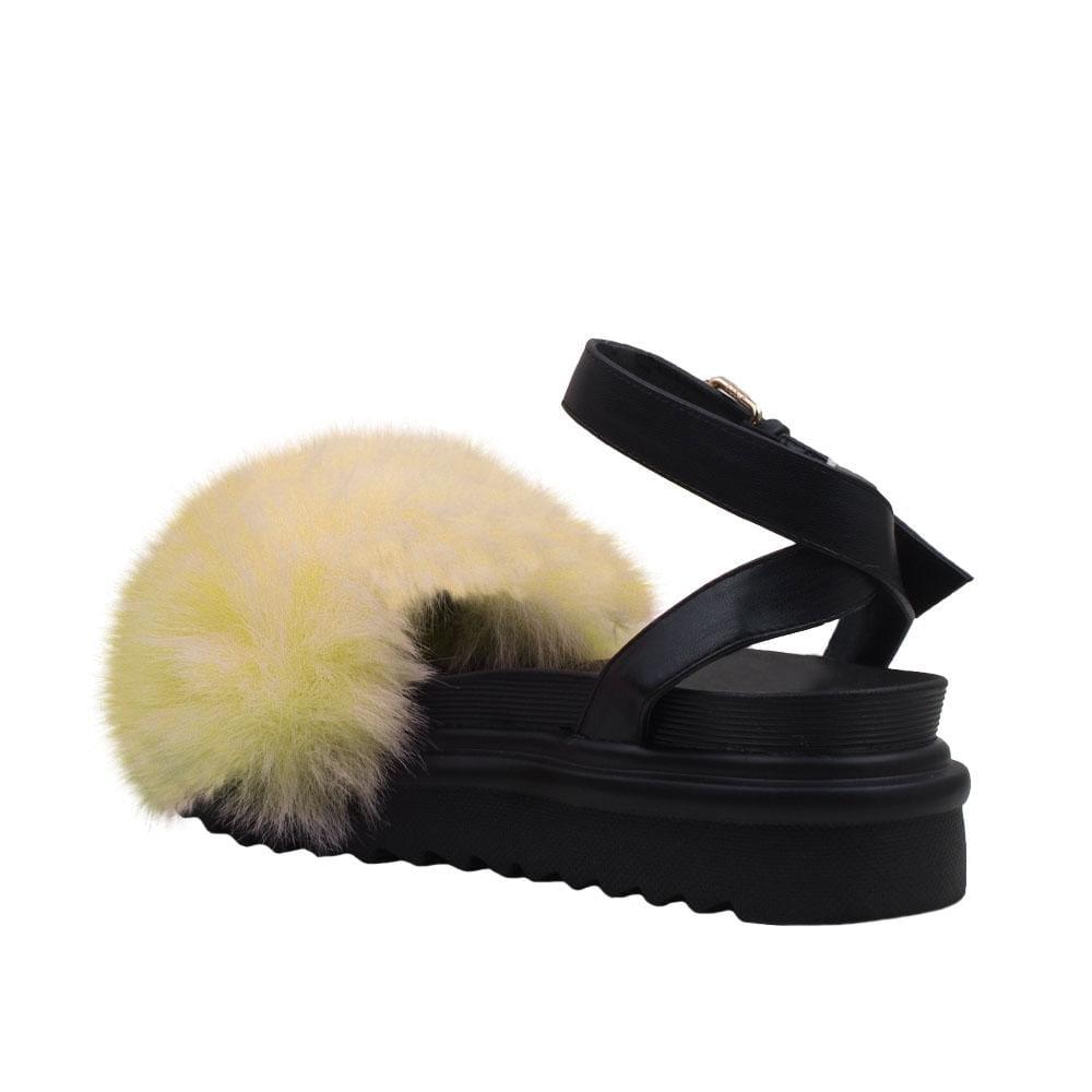 High sole faux fur women slip ons in yellow-posterior view