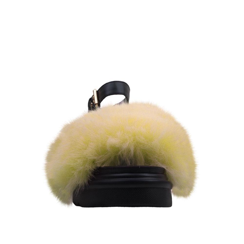 High sole faux fur women slip ons in yellow-front view