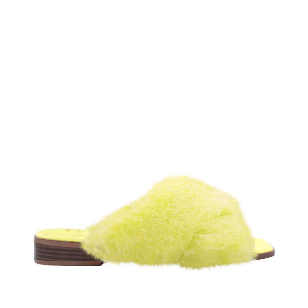 Women slip ons with faux fur accents in yellow