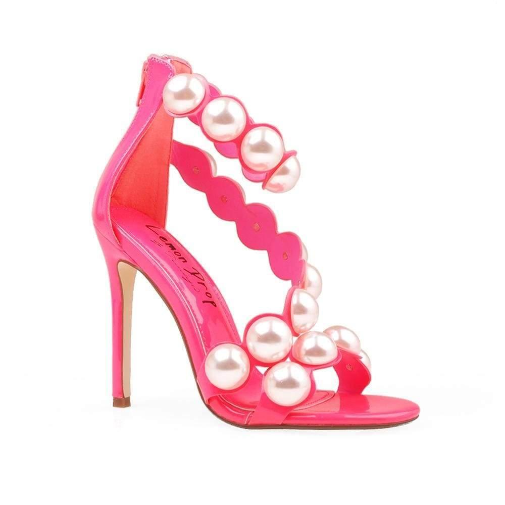 Pink Women Heels with a large pearls design on the strap - corner view