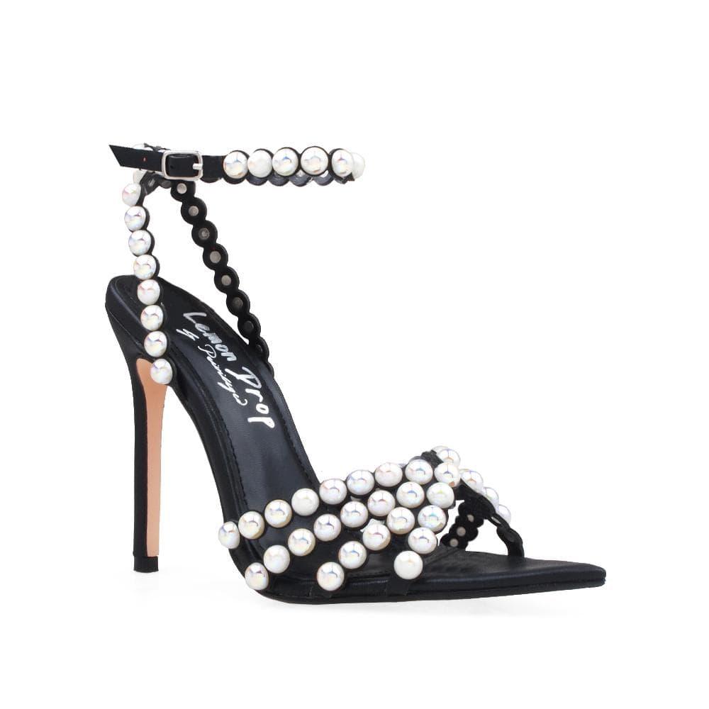 Women's black-colored pearl-encrusted open-toed heels with ankle buckle closure-corner view