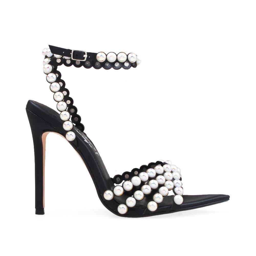 Women's black-colored pearl-encrusted open-toed heels with ankle buckle closure-side view