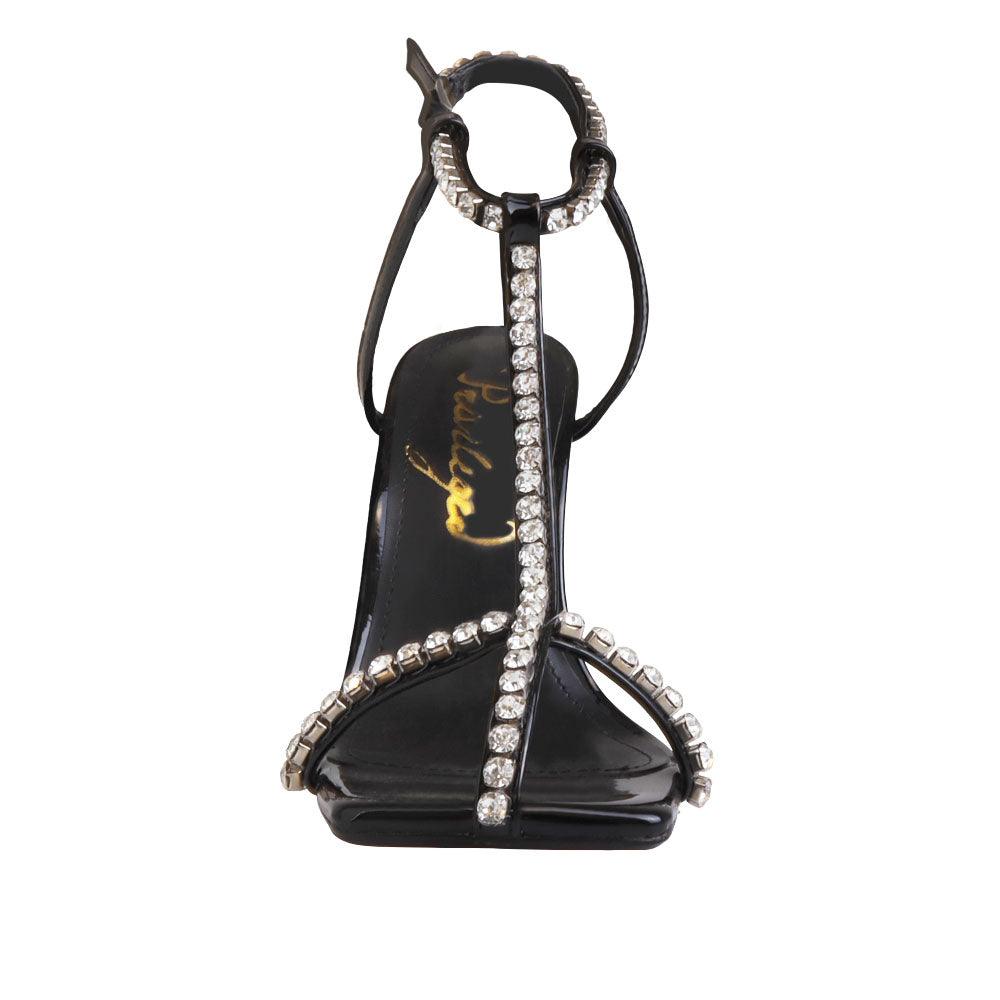 Black colored women heels with silver embellished upper-front view