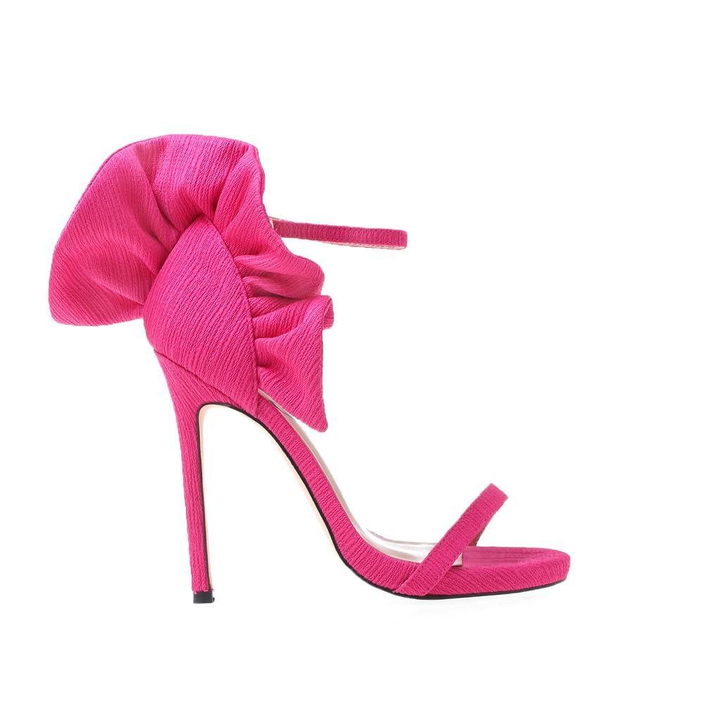 Pink women heels with fabric upper and ankle buckle closure