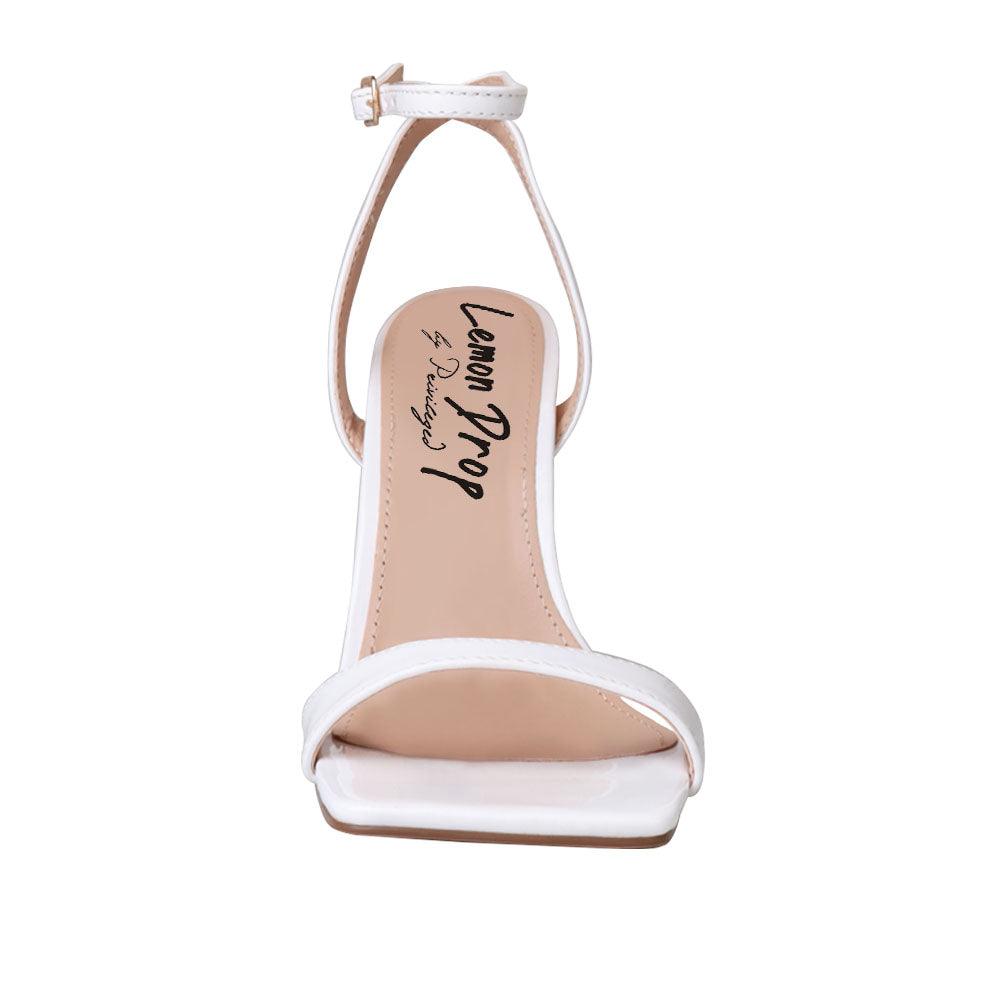 White colored women heels with ankle buckle closure and three tiered pearl heel-front view
