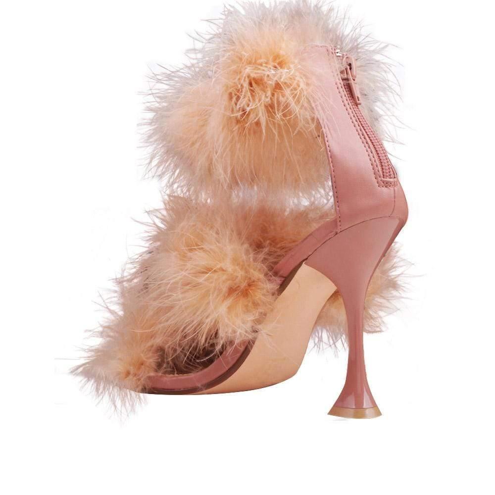 Three tiered fury women heels in tan color with tan heel-posterior view