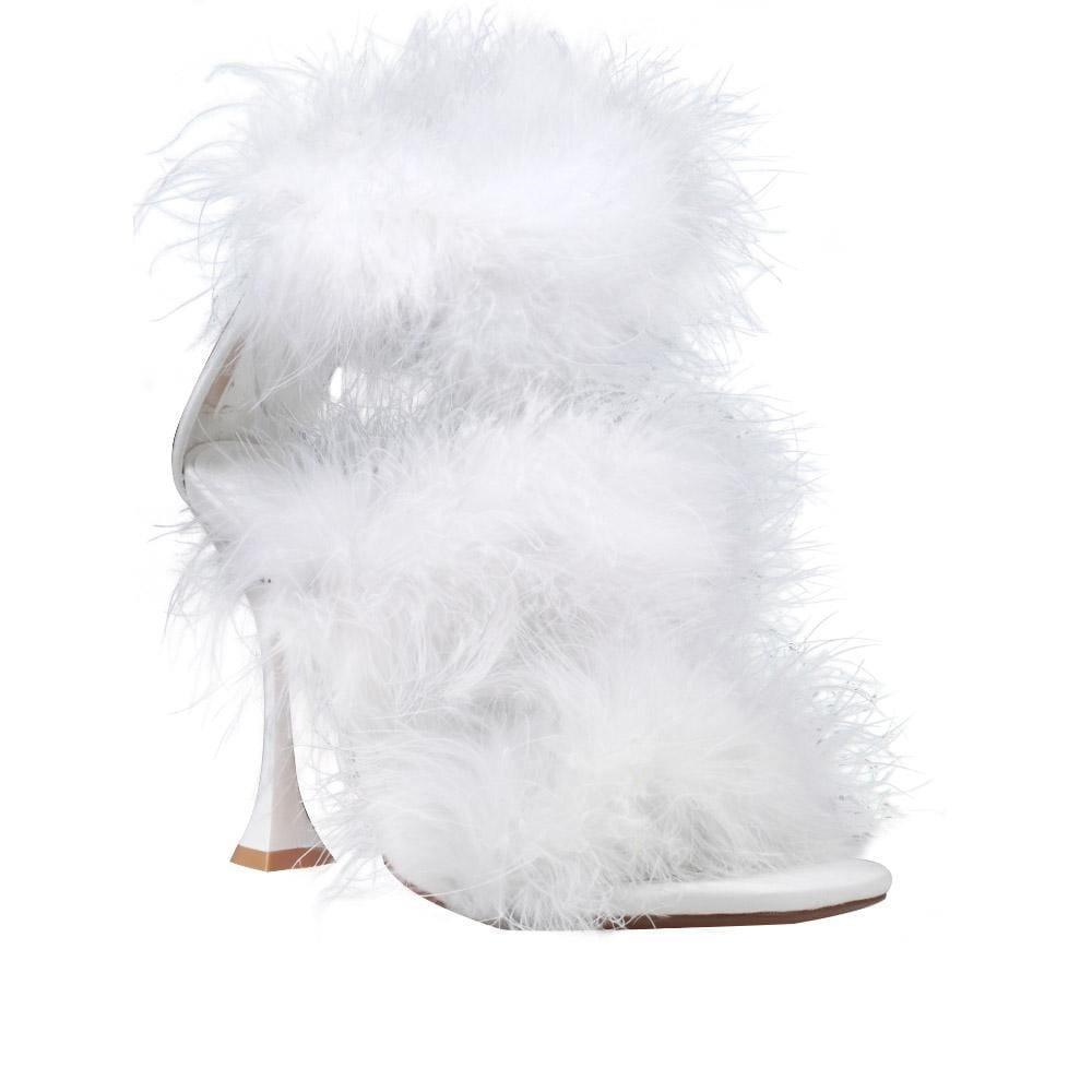 Three tiered fury women heels in white color with white heel-corner view
