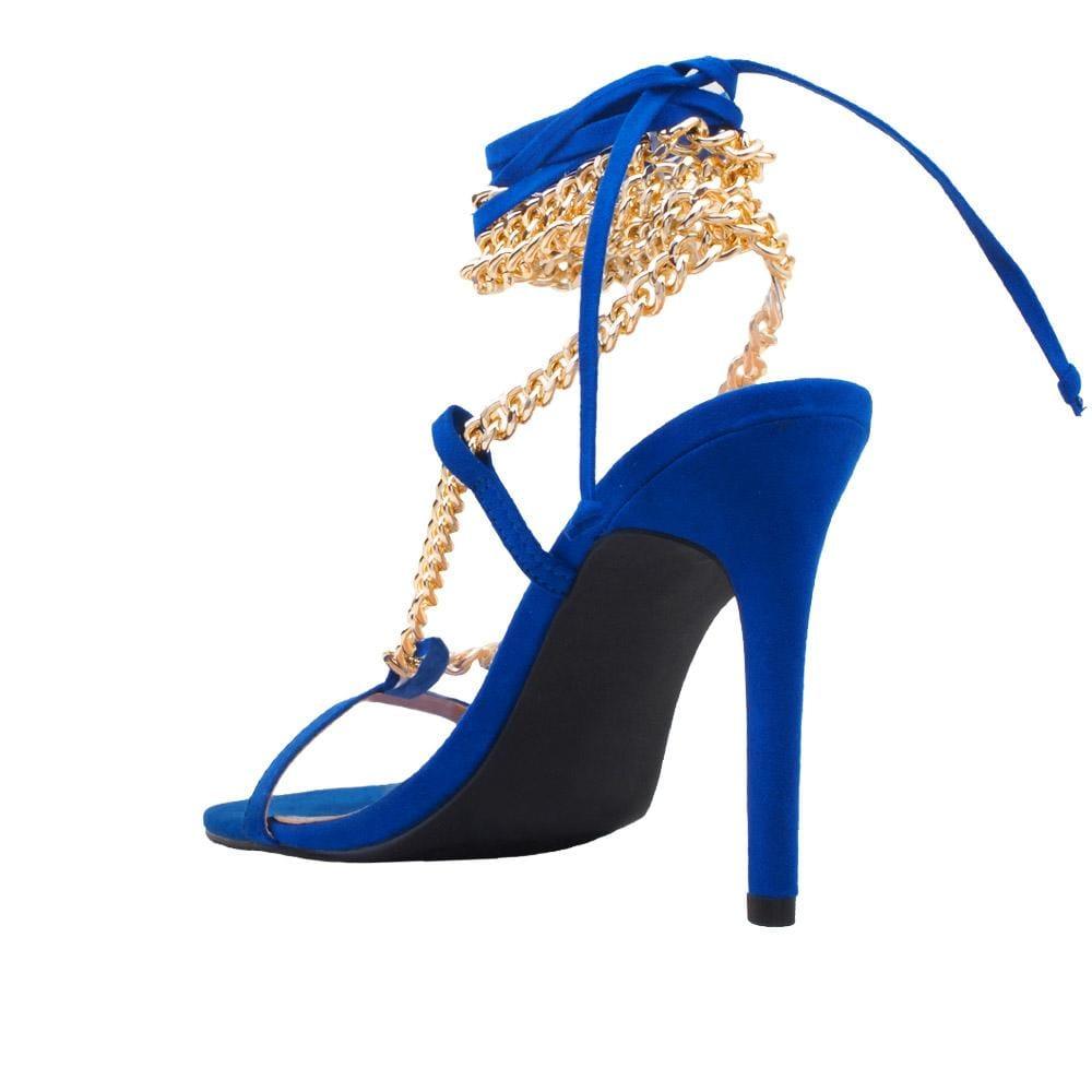 Women heels with gold metal chains and lace tie up in royal blue-posterior view