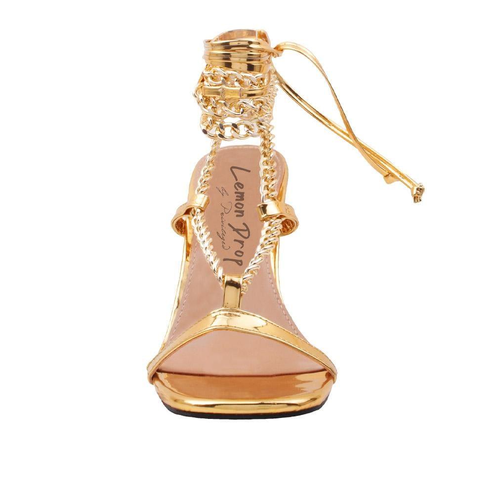 Women heels with gold metal chains and lace tie up in gold-front view